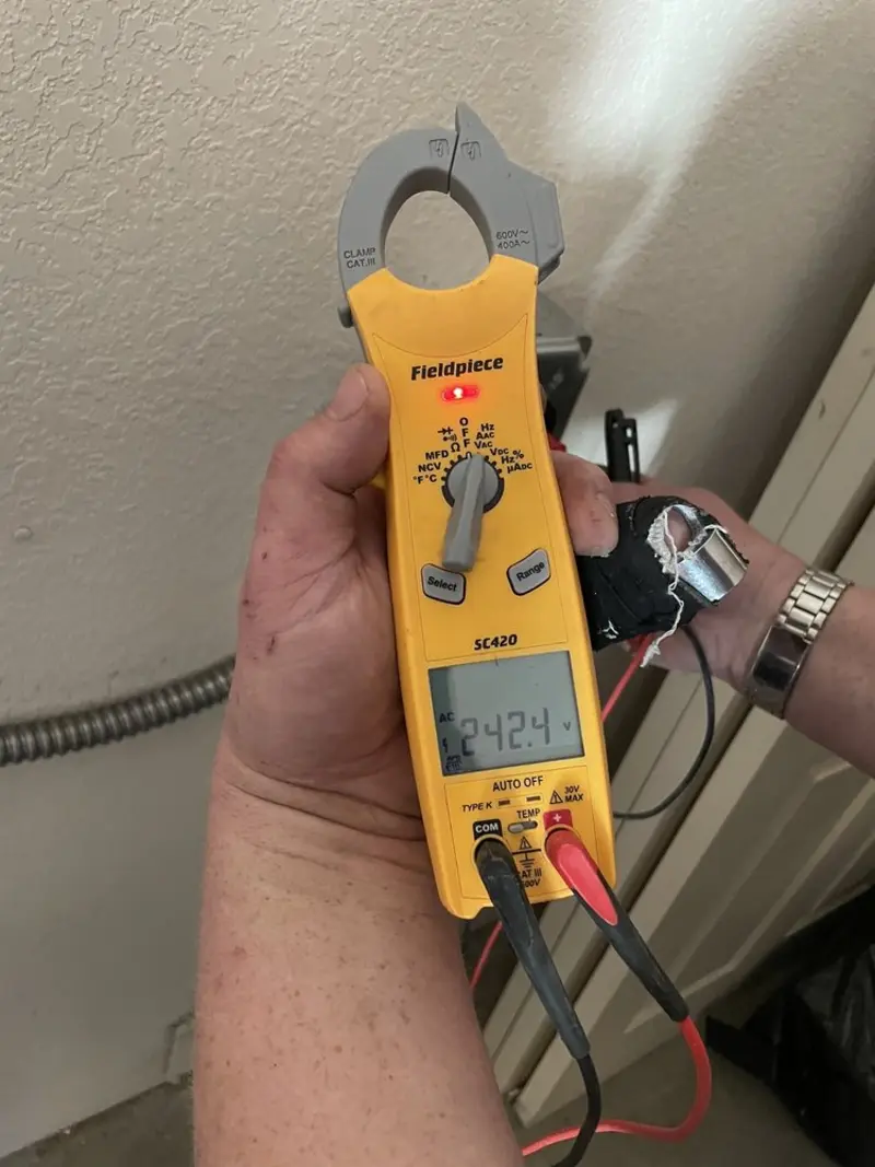 Voltage testing with clamp meter during Circuit Breaker Repair in Kaufman